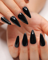 Morily 24Pcs black press-on nails in stiletto shape, medium length, glossy finish.