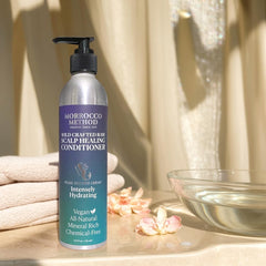 Pouring action demonstrates creamy texture and easy distribution through hair.