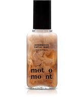 Motomont Milk Tea Mist bottle closeup highlighting premium packaging for hydrated, dewy skin.