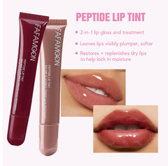 Mrettick applying gloss on lips for natural radiant color.