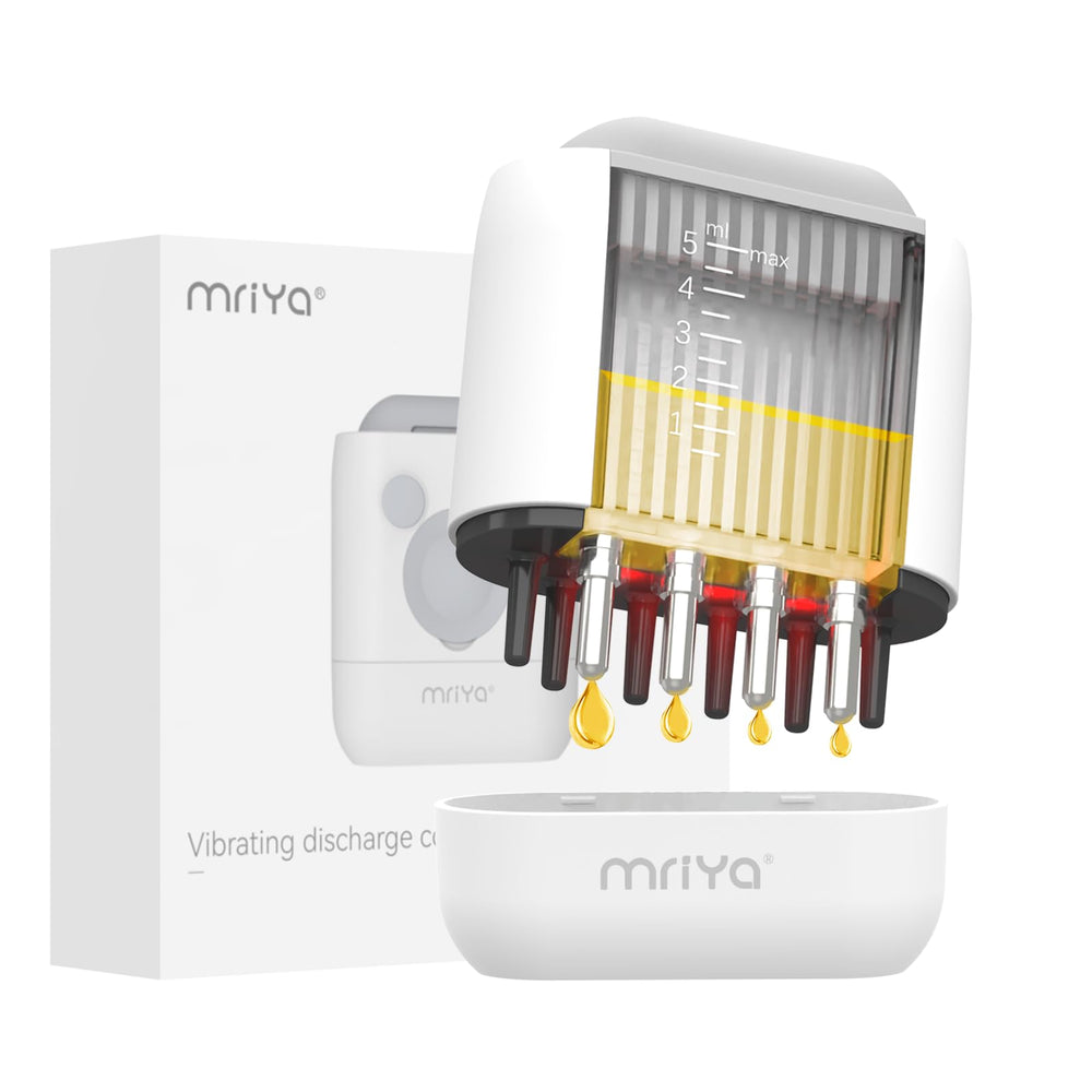 Mriya Hair Oil Applicator with rolling balls delivers precise root treatment and waste minimization.