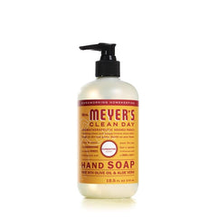 Mrs. MEYER'S Basil hand soap bottle offers cool, crisp scent for refreshed hands.
