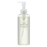 MUJI Mild Cleansing Oil bottle close-up, lightweight formula for makeup removal.