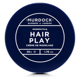 Murdock London Hair Play tin front view showing compact size for travel-ready styling.