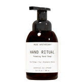 Muse Apothecary Hand Ritual bottle pour reveals cleansing lather and essential oils.