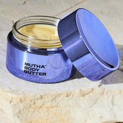 MUTHA Body Butter whipped cream texture ready for nourishing skin.
