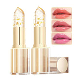 MVC color-changing lipstick with gold crystal cap shows a personalized shade on lips.