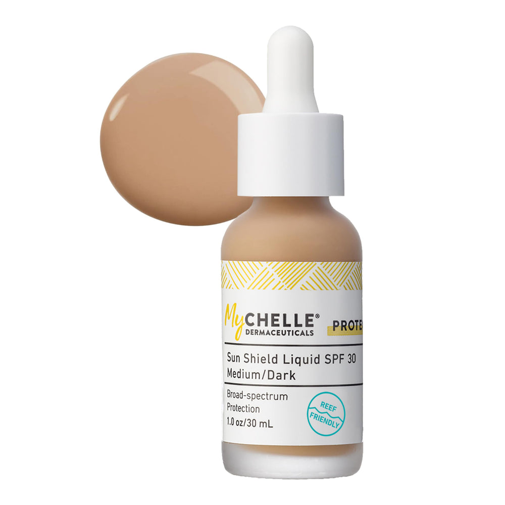 MyChelle Sun Shield Liquid SPF 30 Medium/Dark bottle offers daily mineral protection for all skin types.