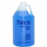 Nairobi Wrapp-It Shine foaming lotion applied evenly for control and manageability.