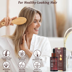 Applying Naixio Batana Oil to the scalp for deep moisture