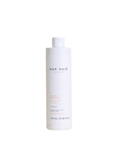 NAK Hair Australia Volume Shampoo bottle front for volumised hair