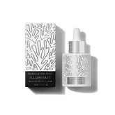 Naked & Thriving Illuminate bottle pour shows silky serum for radiant, even skin tone