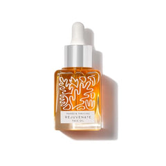 Close-up pour of Rejuvenate Restorative Oil showing silky texture