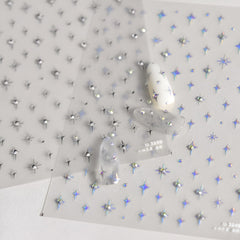 5D embossed star decals add glittery shine to nails.