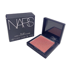NARS Orgasm mini blush compact shows peachy pink with golden shimmer for radiant cheeks.