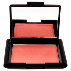 NARS Orgasm X blush swatch shows silky, buildable color on skin