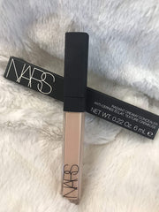 Under-eye application of NARS Radiant Creamy Concealer for natural coverage