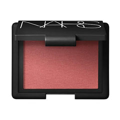 NARS Torrid blush swatch shows warm pink peach glow for a natural flush