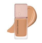 Natasha Denona HY-GLAM Foundation NP10 bottle close-up showing radiant finish