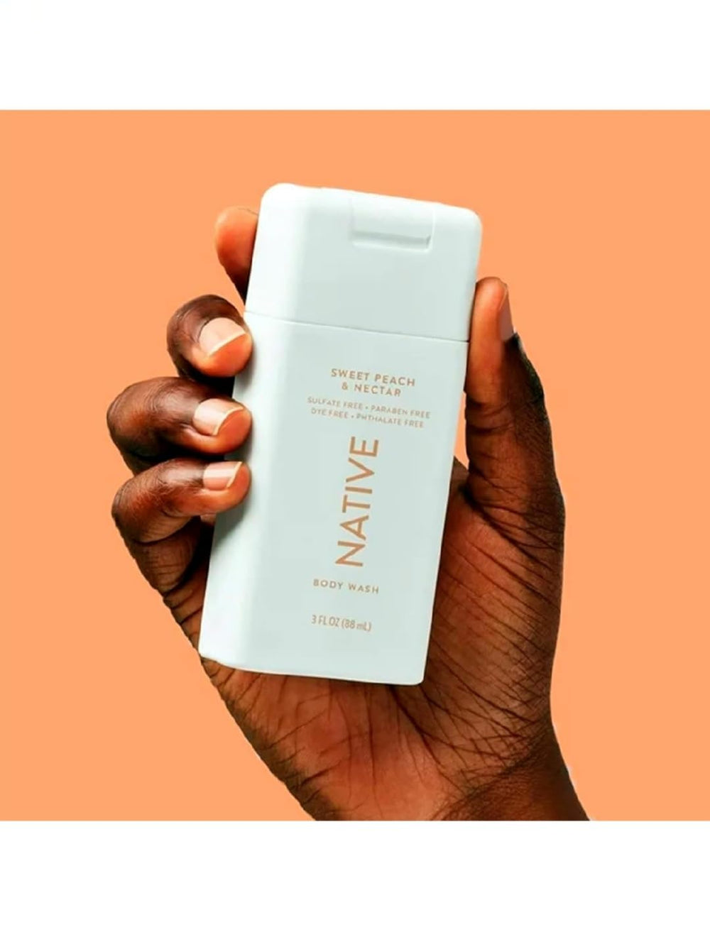 Native travel size body wash bottle with Sweet Peach Nectar scent for a refreshing cleanse