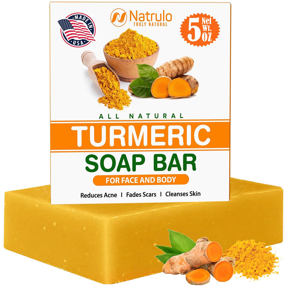 Natrulo turmeric soap bar closeup showing natural texture and color