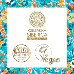 Gently massaging Natura Siberica scrub into scalp to boost renewal.
