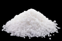 Natural Elephant Dead Sea Bath Salt in a jar ready for easy pouring