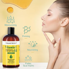 Face application of Natural Riches Vitamin E Oil for improved hydration and texture.