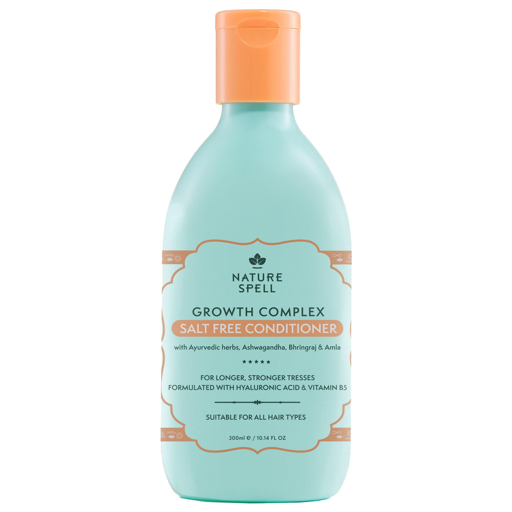 Nature Spell Hair Growth Complex Conditioner bottle close-up showing strength and shine.