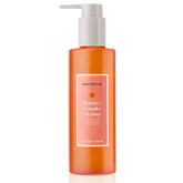 Naturium Vitamin C Complex Cleanser bottle pour for a gentle cleansing ritual.