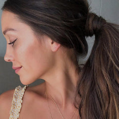 NAVY HAIR CARE Skipper fast-dry spray—even misting for brushable texture.