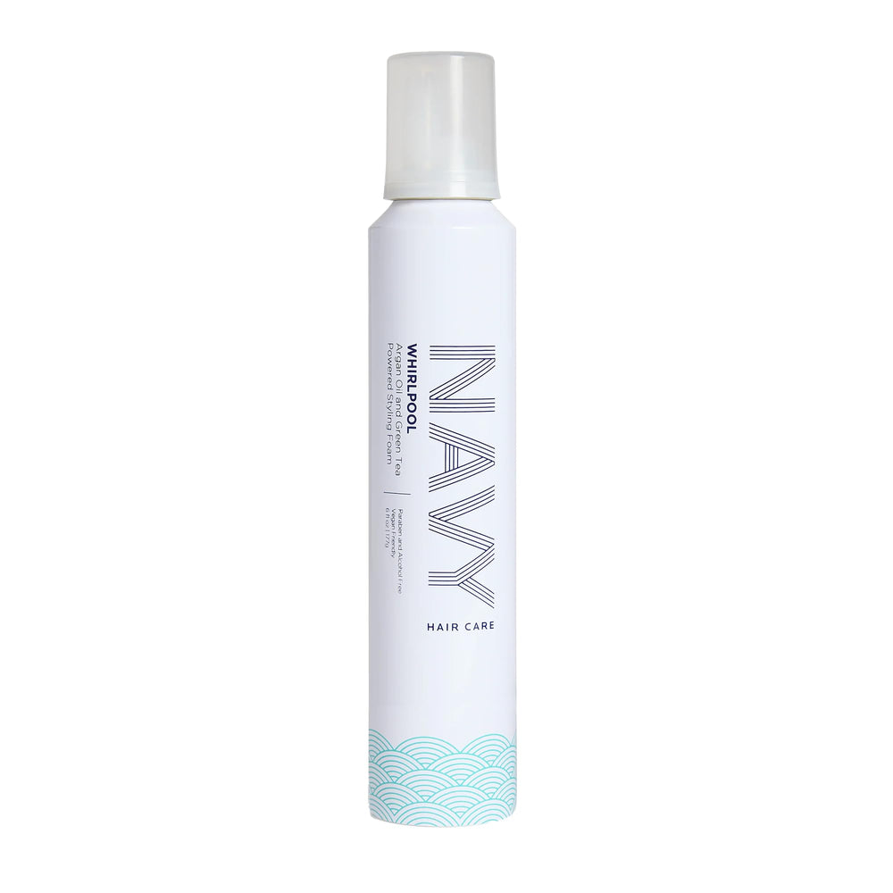 NAVY Hair Care Whirlpool Styling Foam bottle highlighting argan oil for frizz control.