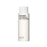 Nécessaire The Conditioner bottle with fragrance-free formula for gentle scalp care.