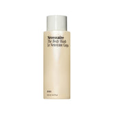 Nécessaire Hinoki body wash bottle foaming lather delivering a soothing, non-drying cleanse.