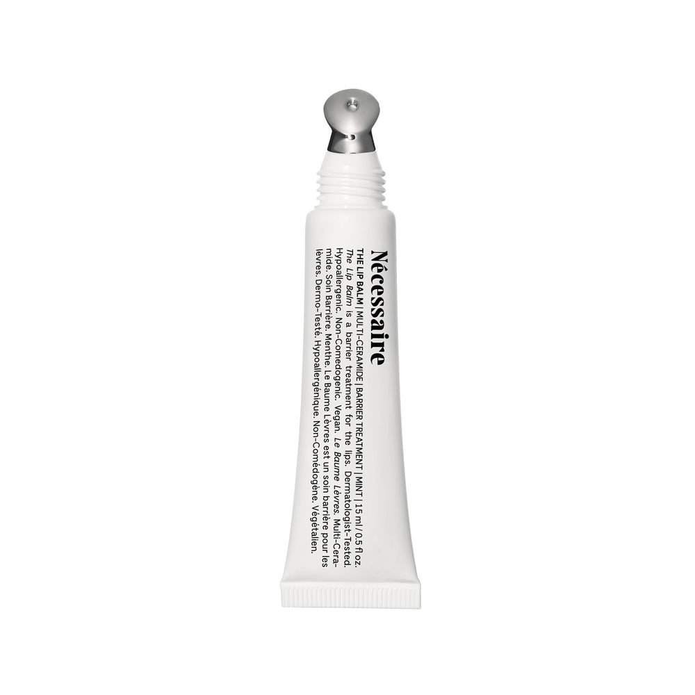 Nécessaire Lip Balm barrier-cream tube provides nourishing protection for dry lips.