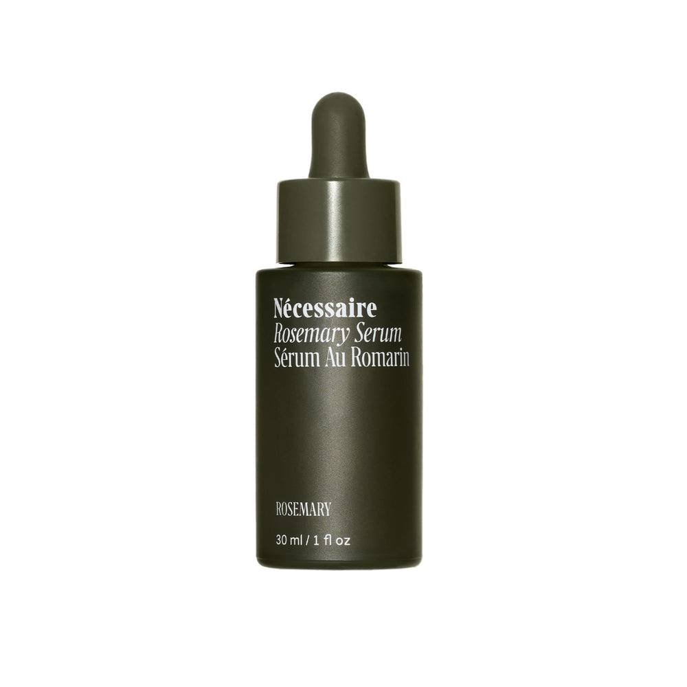 Nécessaire Rosemary Serum bottle close-up showing quick-dry finish.