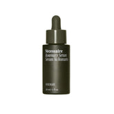 Nécessaire Rosemary Serum bottle close-up showing quick-dry finish.