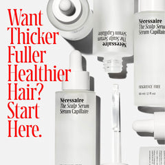 Nécessaire Scalp Serum pipette-dispense demonstrates precise application for targeted thinning areas.