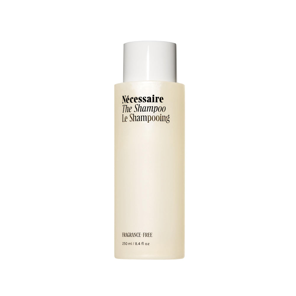 Nécessaire shampoo bottle front view for daily cleansing.