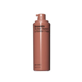 Nécessaire The Body Vitamin C Serum bottle on a clean surface for daily radiance.