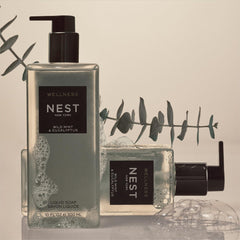NEST New York liquid soap bottle being poured for easy dispensing