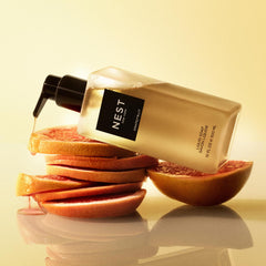 NEST New York Grapefruit Liquid Soap foam dispenses onto skin for cleansing.