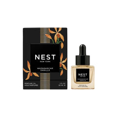 NEST New York Madagascar Vanilla perfume oil bottle with warm amber hue for everyday indulgent aroma.