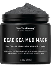 New York Biology Dead Sea Mud Mask on face for clarified pores and glow.