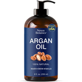 Nexon Botanics Argan Oil bottle pour for light, non-greasy hair nourishment.