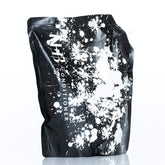 Nicole + Brizee N+B Core Conditioner bottle front showing lightweight hydration for all hair types.