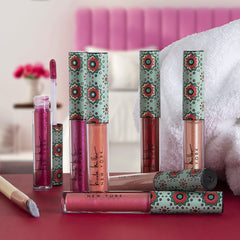 Nicole Miller Lip Gloss Collection shade 02 swatch adds glossy color for bold evening looks