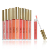 Nicole Miller lip gloss collection swatch bottle showing vibrant shimmer and shade variety.