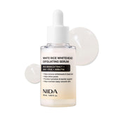 NIDA White Rice Whitehead Serum bottle shown for daily exfoliation and hydration.