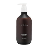 NINEMILA9 Calming Beer Shampoo bottle front highlights a soothing, postpartum-friendly formula.
